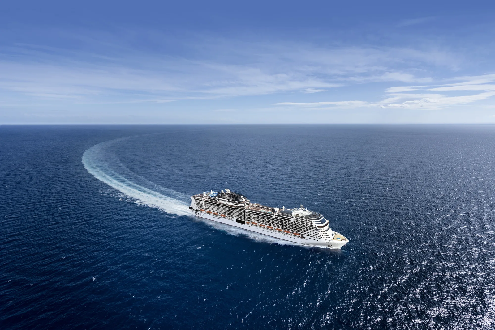 An MSC cruise ship sailing on the open sea